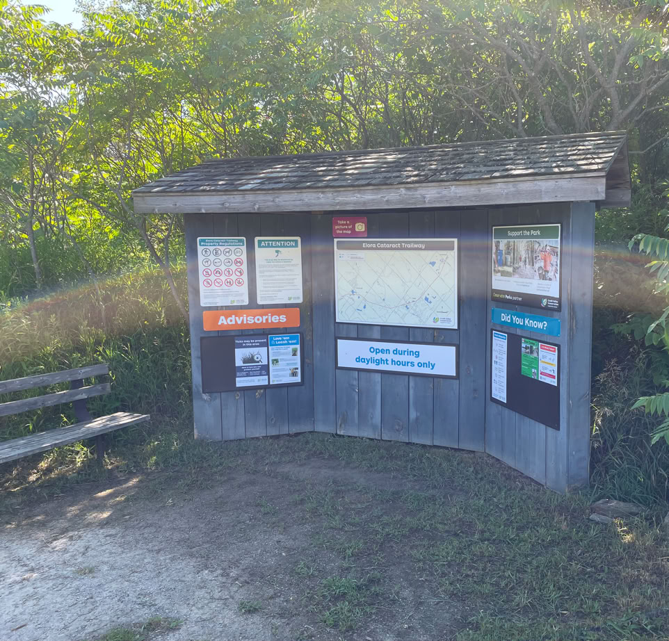 Elora Cataract Trailway kiosk and bench at Mississauga Road 