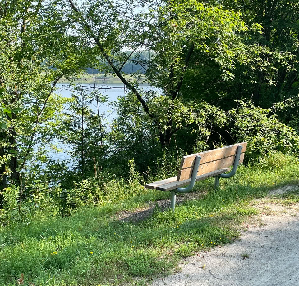 Bench beside the Elora Cataract Trailway overlooking Lake Belwood near Belwood ON