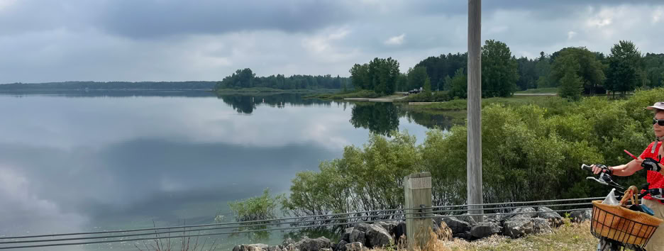 A scenic view of Lake Belwood while approaching the dam on a bike
